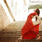 Red dress in the stairway