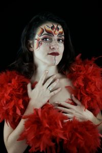Makeup and feather boa